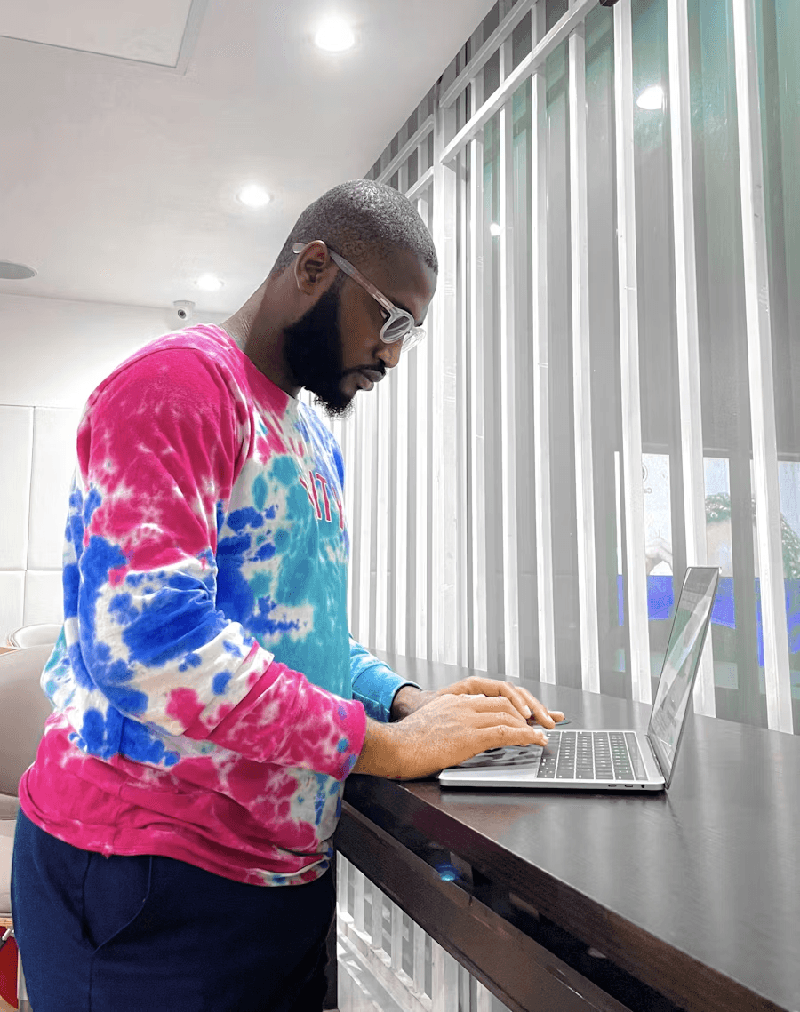 Tutor working from a laptop